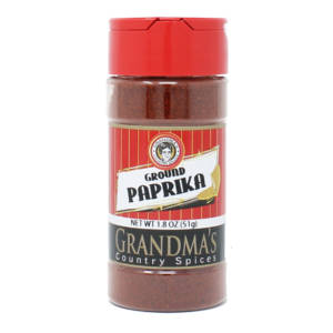 Ground paprika in small spice bottle